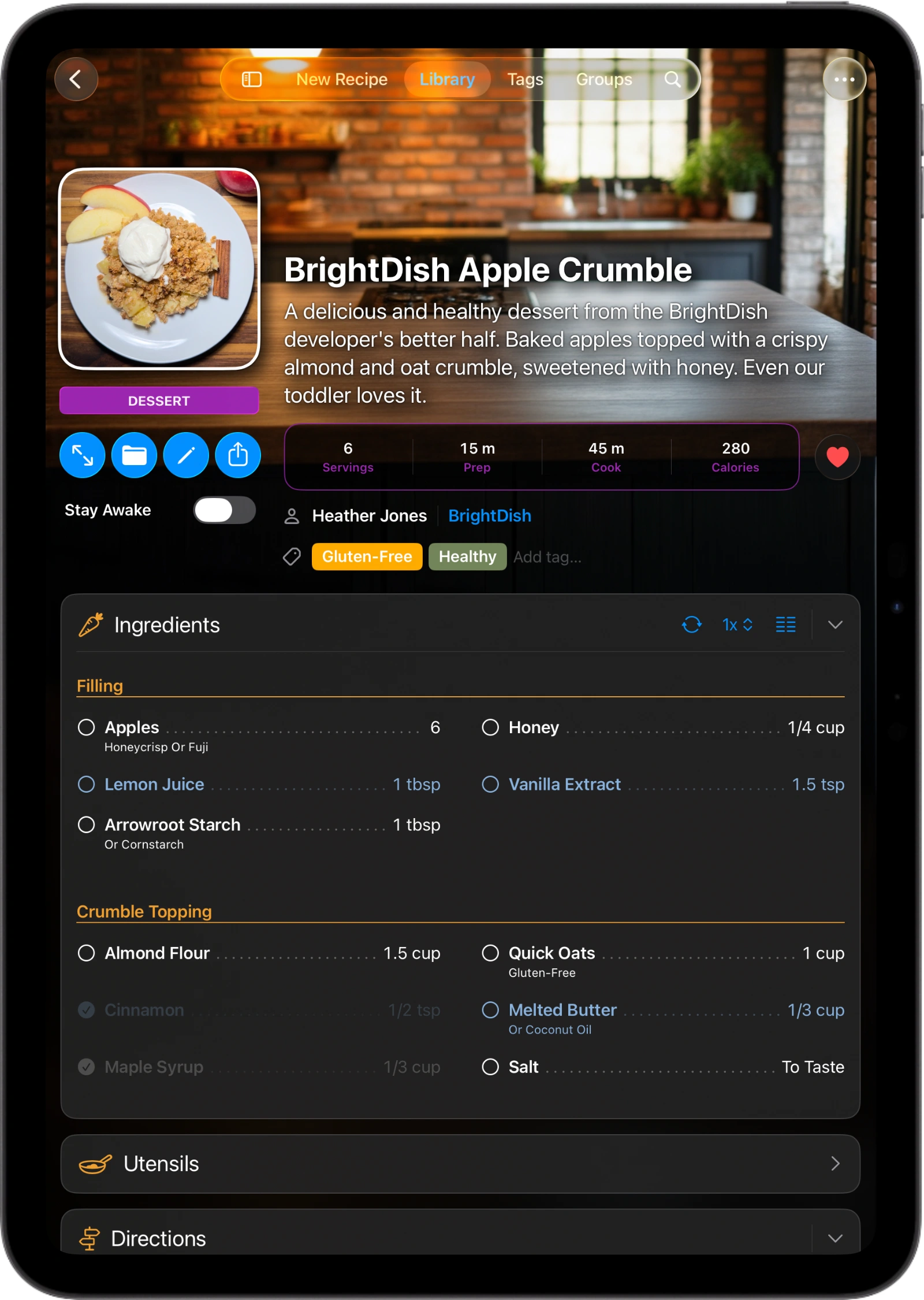 A screenshot of an iPad showing the BrightDish Apple Crumble recipe page, with its photo, summary, ingredient list, and step-by-step directions.